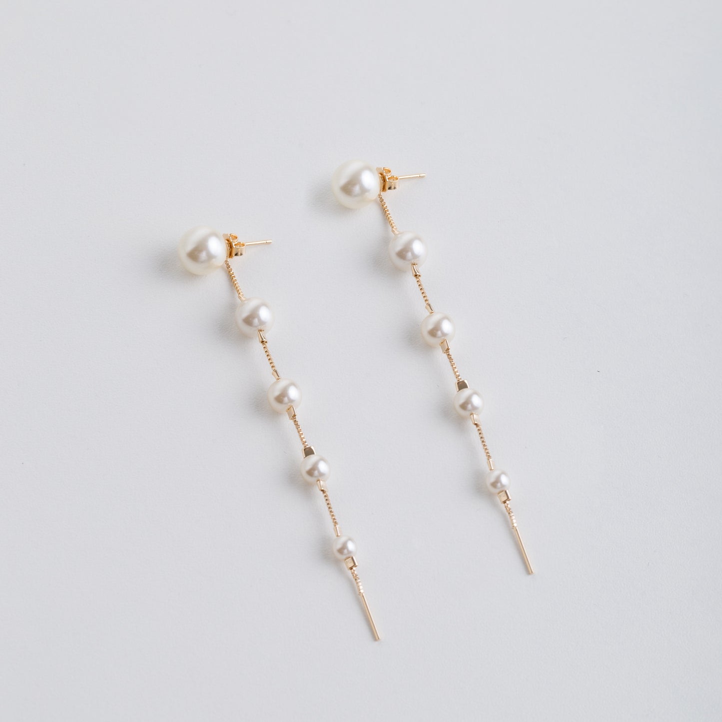 Dangle Pearls Earrings